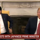 Illustration for article titled President Trump Bestows Deeply Uncomfortable Handshake on Japanese Prime Minister